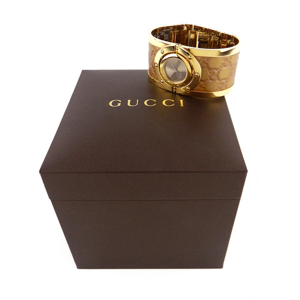 Gucci Gold Twirl Wide Leather Cuff Watch